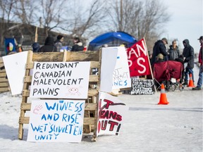Community members gather along train tracks by 20th St and Ave J in solidarity with the Wet'suwet'en hereditary chiefs. Photo taken in Saskatoon, SK on Monday, February 24, 2020.
