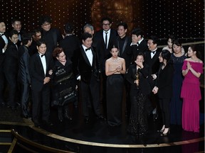 "Parasite" cast and crew accept the award for Best Picture for "Parasite" during the 92nd Oscars at the Dolby Theatre in Hollywood, California on February 9, 2020.