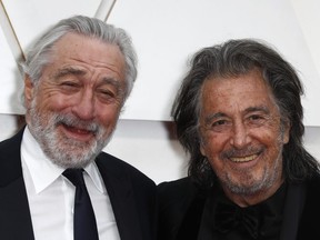 Robert De Niro and Al Pacino pose on the red carpet during the Oscars arrivals at the 92nd Academy Awards in Hollywood, Los Angeles, California, U.S., Feb. 9, 2020.