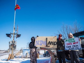 First Nations members of the Tyendinaga Mohawk Territory block train tracks servicing Via Rail, as part of a protest against British Columbia's Coastal GasLink pipeline, in Belleville, Ontario, Canada February 8, 2020.