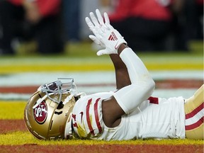 San Francisco 49ers receiver Emmanuel Sanders demonstrates his disappointment after being overthrown by quarterback Jimmy Garoppolo during the fourth quarter of Sunday's Super Bowl against the Kansas City Chiefs.