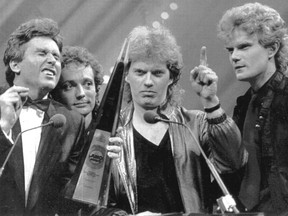 Loverboy accepts the Juno award for group of the year at the 1983 Junos