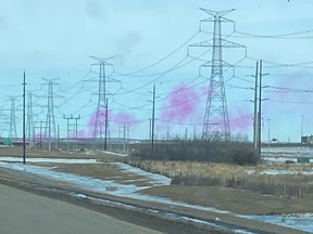 A pink/purple smoke fills the air east of Edmonton on Friday, Feb. 28, 2020. (Supplied photo/Eric Kinch)