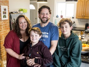 Anthony McCarthy of the Saskatoon Club (centre back) is pictured with his partner Anastasia Winterhalt and sons Thomas and Jacob.