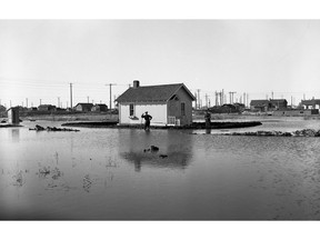 A photo of flooding on Avenue V South, from April 2, 1951. (City of Saskatoon Archives StarPhoenix Collection S-SP-B1167-1)
