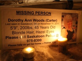 A sign seen during a candlelight vigil held for Dorothy Woods on Nov. 26, 2011 in Saskatoon, Sask.