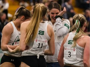 The University of Saskatchewan women's 4x400 relay team, led by Michelle Harrison, celebrate a record-setting gold -medal performance at the Canada West track and field championships at the Saskatoon Field House on Saturday, February 22, 2020 in Saskatoon.