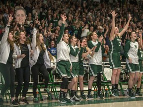 Players on the University of Saskatchewan Huskies' bench cheer during their Canada West conference win against the University of Alberta Pandas on Friday, February 28, 2020. The Huskies enter this week's U Sports Final 8 national championship tournament as the No. 1 seed and favourite.