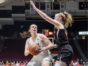 Kyla Shand (left) and the University of Saskatchewan Huskies beat out the Carleton University Ravens in the U Sports Final 8 women's quarterfinal basketball game at TD Place Arena in Ottawa on Thursday, March 5, 2020. Photo by Valerie Wutti/U Sports.