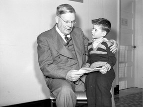 Saskatoon mayor John Sproule Mills poses with Jack Forsythe for the Easter Seal Campaign on Feb. 6, 1951. (StarPhoenix archives)