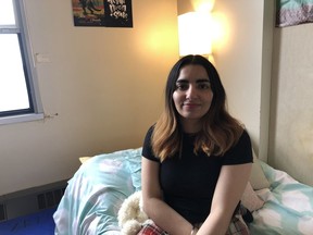 Harleen Aurora, a second-year human resources student from India at the University of Saskatchewan, was told that she would be able to stay in her room at residence until the end of April. The U of S announced Monday that its buildings will close to all but essential staff this week and that students who are able to move out of the dorms must do so on Wednesday. Aurora is seen in her dorm room on Monday, March 23, 2020. (Harleen Aurora photo)