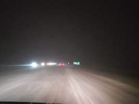 Heavy snowfall and winds produced dangerous driving conditions on Highway 11 between Osler and Hague late Saturday evening. Photo from Facebook / Colleen Gurgul.