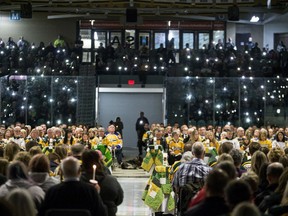 Members of the community joined with Broncos families by lighting up their phones during the Humboldt Broncos First Year Memorial service at Elgar Petersen Arena in Humboldt on Saturday, April 6, 2019.