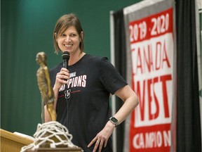 University of Saskatchewan Huskies women's basketball head coach Lisa Thomaidis speaks with the Bronze Baby trophy during a rally, celebrating the team's second Canadian title, at the PAC on the U of S campus in Saskatoon on Wednesday, March 11, 2020.