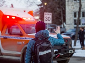 A parade of emergency vehicles pass by Royal University Hospital to honour the frontline healthcare workers in Saskatoon, SK on Friday, April 3, 2020.