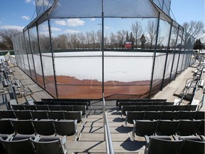 A softball diamond at the Gordie Howe Sports Complex is seen empty, covered with snow, in Saskatoon on April 16, 2020. Sports fields in Saskatoon are off-limits until at least July.