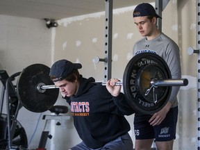 Saskatoon Contacts player Riley Heidt, left, trains at home with his brother Tyler. Photo taken on the family's acreage, near Saskatoon, on Monday, April 20, 2020.