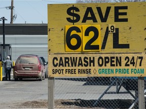 An uncommonly low fuel price is shown on a sign at a service station on Saskatchewan Drive.