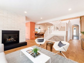 On The Mark Homes made generous use of natural white oak throughout the Kinsmen lottery home, including the beautiful hardwood floor and numerous built-ins. The fireplace is trimmed in paint grade brick to add a touch of industrial chic.