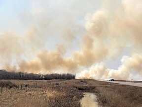 A large grass fire west of Saskatoon threatened acreages Saturday afternoon. Multiple fire crews worked to control the flames. Rain on Sunday helped as well. Photo supplied by Crystal Cockrum