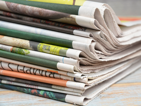 A stack of newspapers.