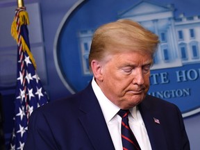 U.S. President Donald Trump leaves a Coronavirus Task Force news conference at the White House in Washington, D.C., U.S., on Thursday, April 2, 2020.