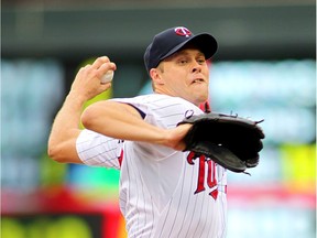Andrew Albers, then a member of the Minnesota Twins, throws against the Toronto Blue Jays during their MLB game on September 8, 2013 at Target Field in Minneapolis, Minnesota.