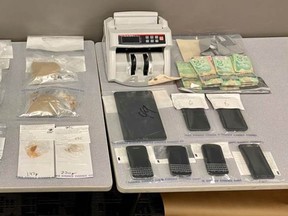 Drugs, cash and phones seized by Saskatoon police (photo courtesy Saskatoon Police Service)