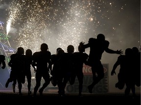 A traditional fireworks display brings the University of Saskatchewan Huskies football team out from the Dog House for a date with the University of Calgary Dinos.