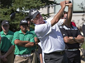 Golfing legend Freddie Couples tees off for a round of golf with Jay Haas as part of the Synergy 8 Drive For Kids Campaign, August 26, 2014