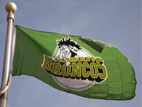 A Humboldt Broncos flag flies in front of Regina's City Hall iBRANDON HARDER/ Regina Leader-Post