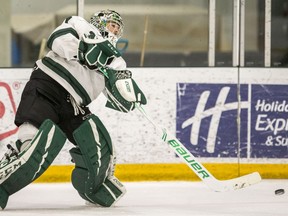 University of Saskatchewan Huskies goalie Taran Kozun shoots the puck against the University of Regina Cougars during U Sports men's hockey action at Merlis Belsher Place on the U of S campus in Saskatoon on Friday, February 7, 2020.