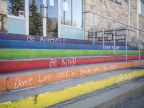 Messages of kindness are written in chalk on the stairs of Grosvenor United Church. The church, along with McClure United Church and St. Andrew's College at the University of Saskatchewan, were vandalized on May 10, 2020 with homophobic messages.