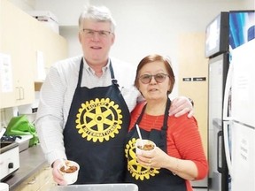 Rotary Club of Saskatoon North President Bob Anderson and Rotarian Prescilla Mah