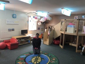 Jean Badger, Aboriginal HeadStart coordinator at La Ronge's Kikinahk Friendship Centre, in an empty classroom on Monday. Photo courtesy executive director Ron Woytowich.