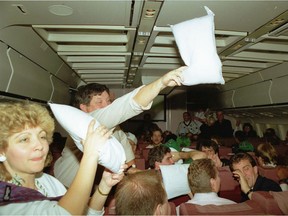 A pillow fight breaks out on the Saskatchewan Roughriders' flight home from Toronto, one day after they won the 1989 Grey Cup.