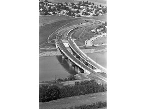 A photo of people walking across the 42nd Street Bridge (now Circle Drive Bridge) during its official opening, from July 2, 1983. (City of Saskatoon Archives StarPhoenix Collection S-SP-A20377-20)