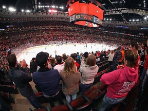 Fans applaud at the United Center on March 11 after the Chicago Blackhawks posted a 6-2 NHL victory over the San Jose Sharks. Due to COVID-19, an NHL game has not been played since that March 11 evening.