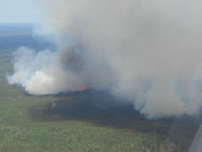 A wildfire near Southend in northern Saskatchewan burns in June 2018. A new report suggests including cultural considerations for Indigenous communities threatened by wildfires. (Saskatoon StarPhoenix).