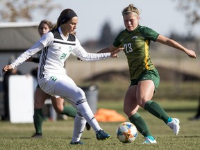 University of Saskatchewan Huskies defender Jacqueline Altrogge battles for the ball with University of Regina Cougars forward Kyra Vibert in Sport Women's soccer action at Field 7 at Nutrien Park on the U of S campus in Saskatoon on Friday, October 11, 2019.