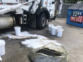 More than 200 litres of oil leaked inside a City of Saskatoon garbage truck after someone put multiple five-gallon pails in a recycling bin. The contents of the bin were deemed too contaminated to recycle before the oil was discovered.