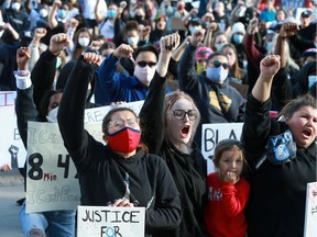 Thousands chant "I can't breathe" in front of Saskatoon police headquarters during a rally in honour of George Floyd and to stand up against social injustice. Photo taken in Saskatoon on June 4, 2020.