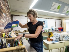 Elaine Krause cleans out her classroom at École Forest Grove School as she prepares for retirement.