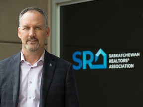 Jason Yochim, the CEO of the Saskatchewan Realtors Association, stands outside the association's building on McIntyre Street in Regina.