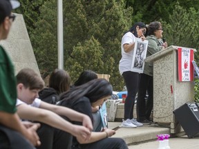 Charmaine Dreaver, left, the mother of Jordan Lafond who died in 2016 following a police pursuit, and his grandmother Grace Lafond speak during a rally calling on the province to institute reforms to police oversight and create a civilian-led body that will investigate allegations made against police at City Hall in Saskatoon, SK on Saturday, June 20, 2020.