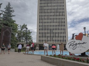 Swimmers with the Regina Optimist Dolphins and other Regina-based swim clubs gather at city hall to demonstrate and plead their case to have swimming pool openings reconsidered in Regina, Wednesday, June, 24, 2020.