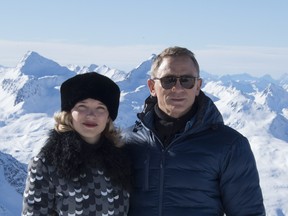 British actor Daniel Craig (L) poses with actress Lea Seydoux of France in a 2015 photo. Their characters apparently become parents in the upcoming James Bond film.