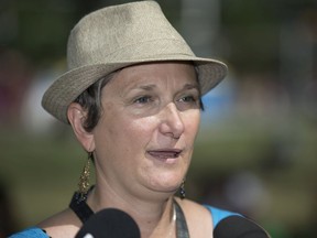 Regina Folk Festival artistic director/ executive director Sandra Butel speaks before the kickoff of the 50th RFF in 2019 in Victoria Park.