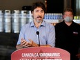 Prime Minister Justin Trudeau speaks to the media as he visits the Big Rig Brewery, which utilizes the Canada Emergency Wage Subsidy given to businesses affected by COVID-19, in Kanata, Ont., Friday, June 26, 2020.