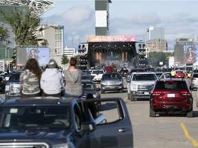 Fans watch as Brett Kissel performed a drive-in concert at Evraz Place in Regina on Saturday, June 20, 2020. This is the 7 p.m. show, the second of three concerts he played that day.